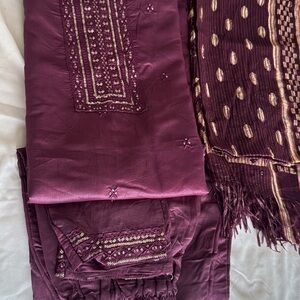 Brand new wine colored Indian dress with pant style bottom.